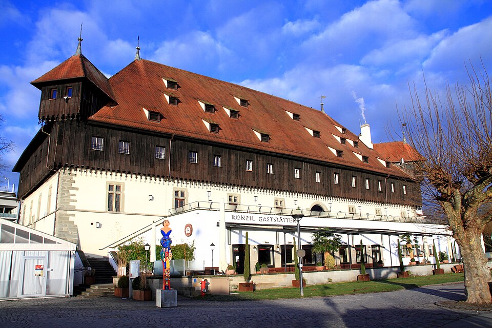 The large historic Konzil building on the waterfront at Konstanz harbour.