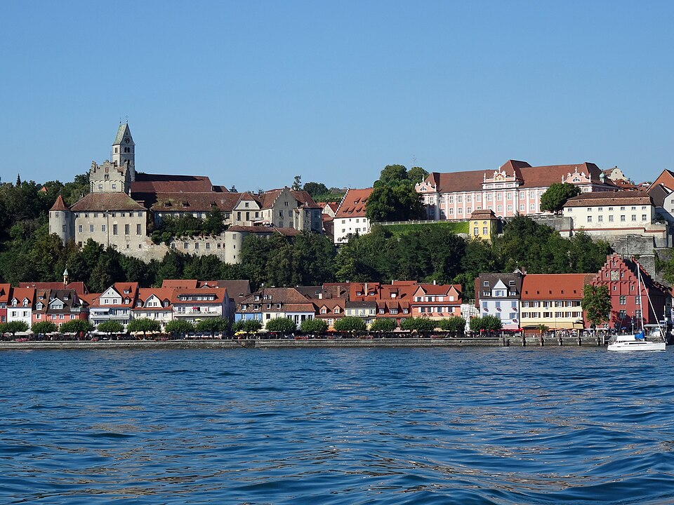 The town of Meersburg rising in terraces above Lake Constance beneath its old and new castles.